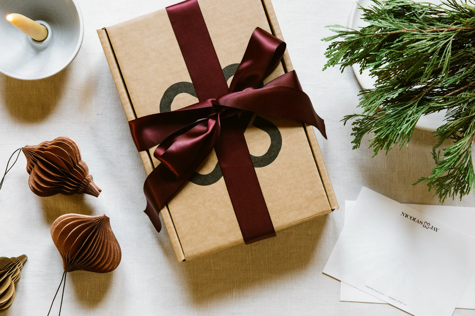 Pic 5 Wrappes box of Nicolas-Jay wine next to ornaments