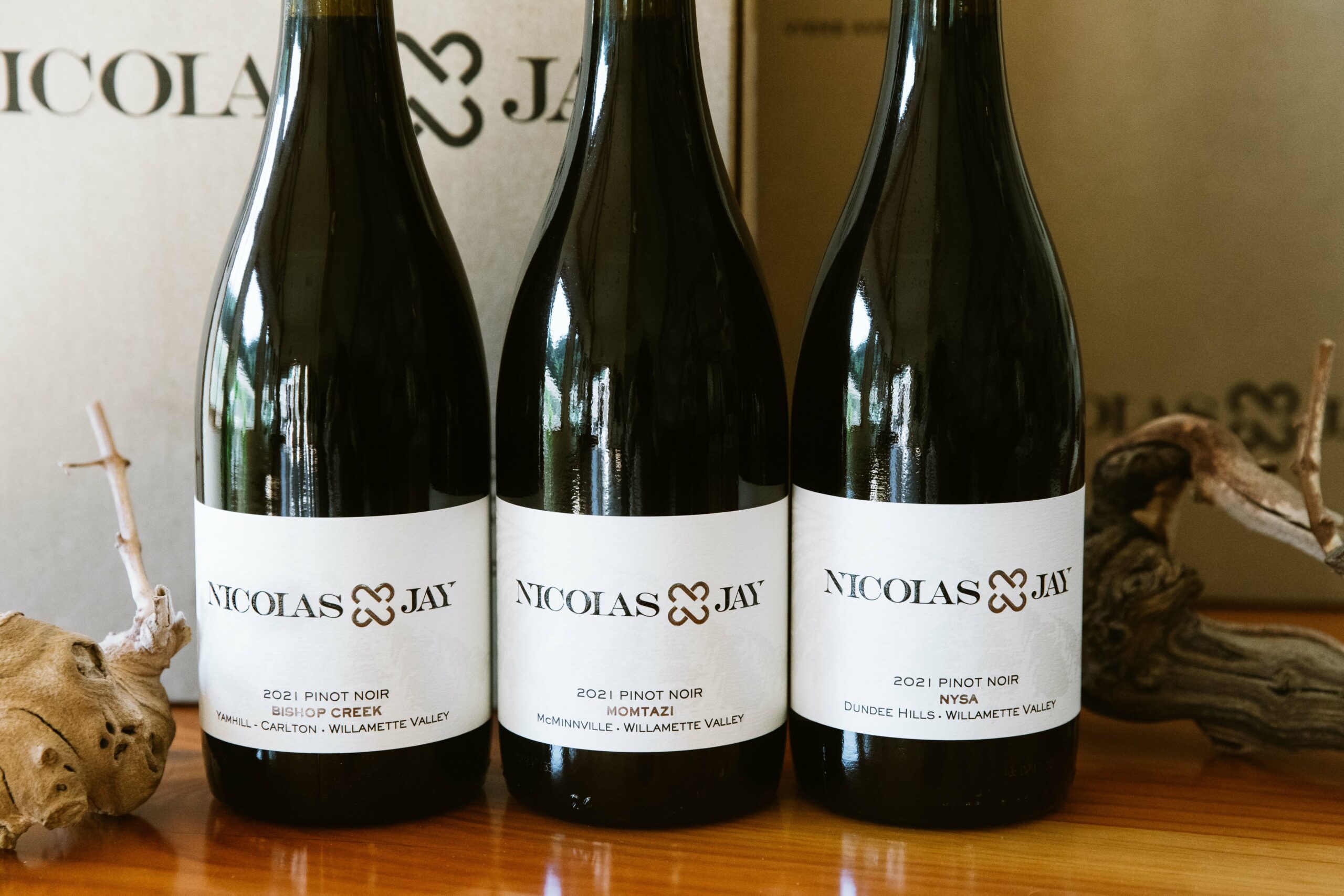 Three bottles of Nicolas-Jay Pinot Noir